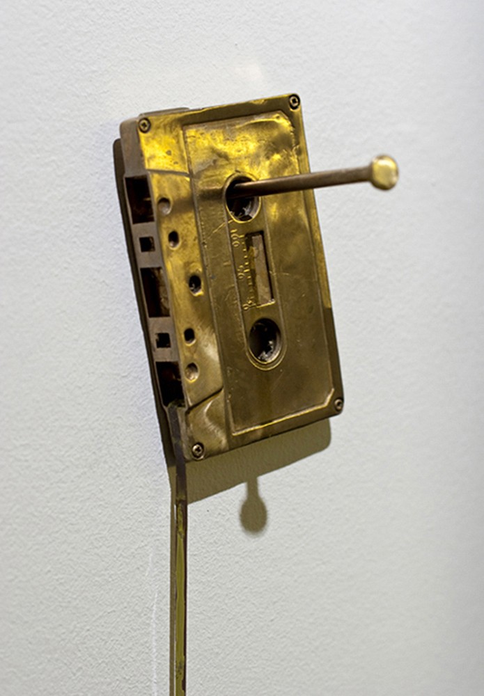 'Mono '89', 2009. Bronze, paint, magnetic tape. Size: 4.5 x 3 x 3 inches